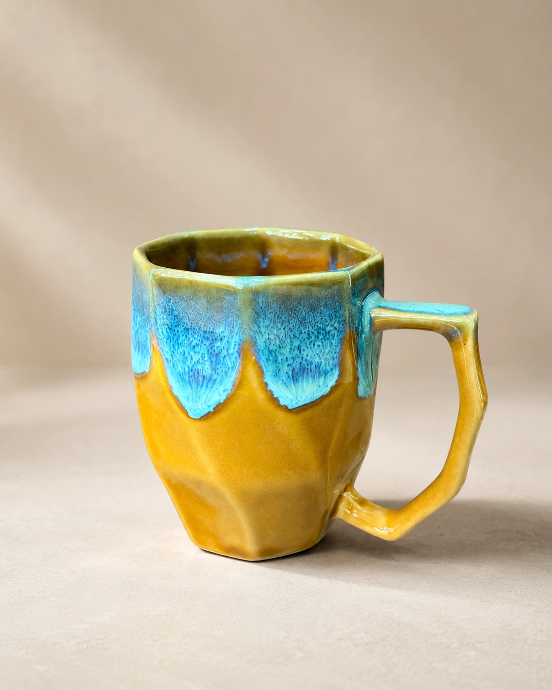 Marigold Lagoon Drip Ceramic Mug by Hira Industries