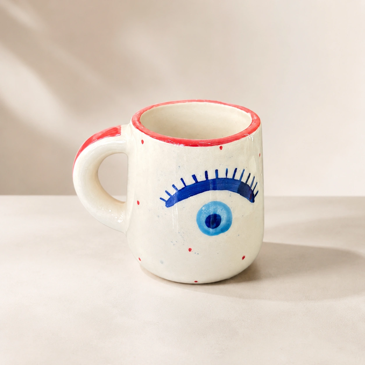 Winking Nazar Ceramic Mug by Hira Industries
